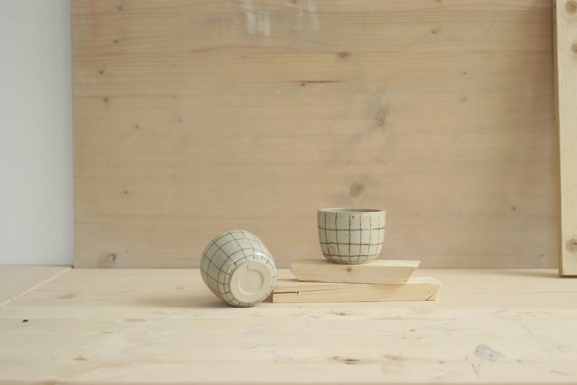 Handmade speckled stoneware ceramic sip cup in grid pattern and clear glaze. Made with lots of love in Lithuania.