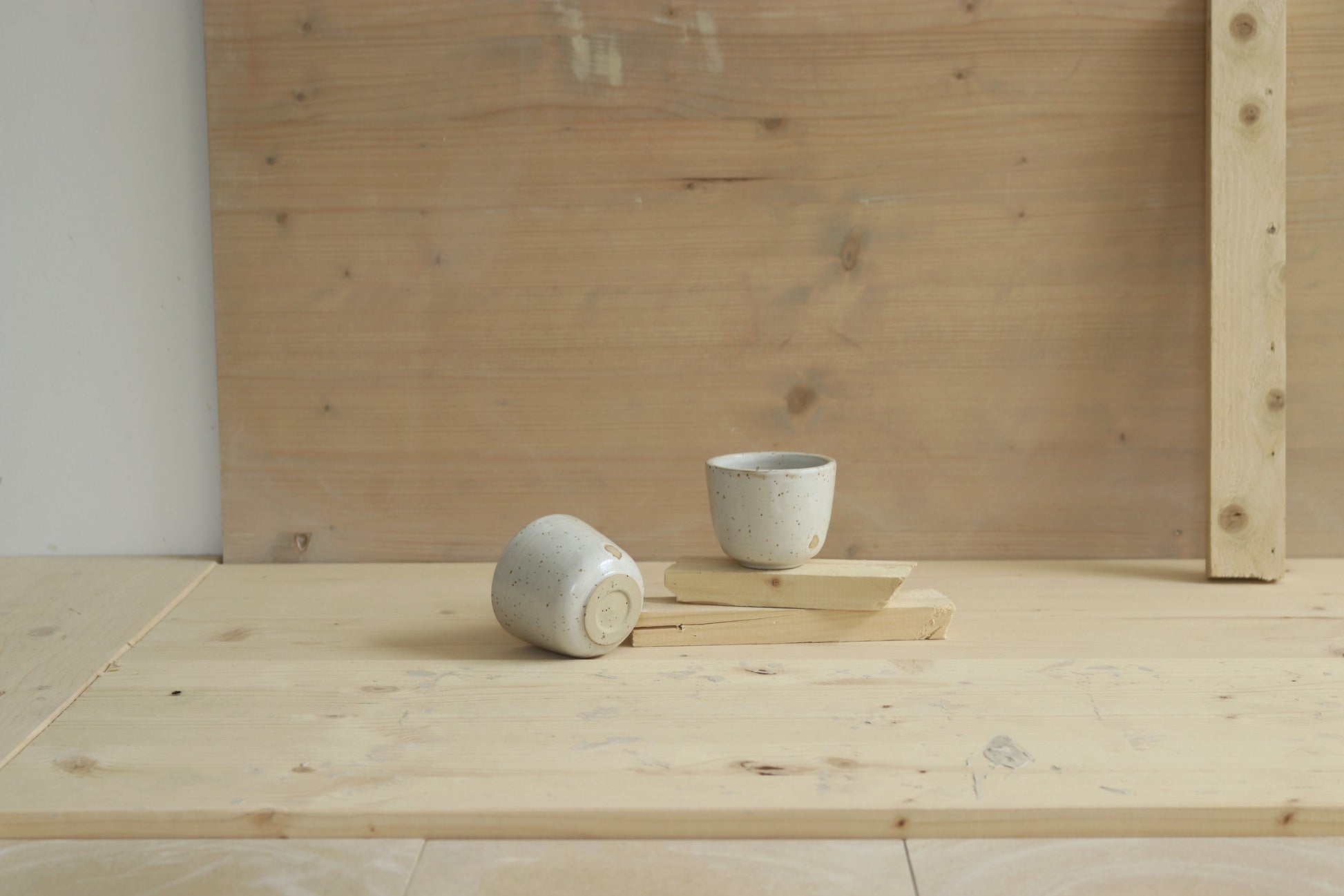 Handmade speckled stoneware ceramic sip cup in satin white glaze. Made with lots of love in Lithuania.