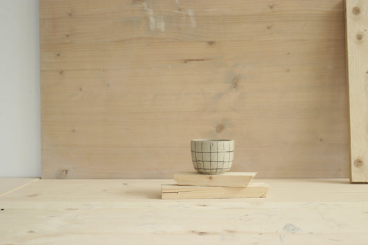 Handmade speckled stoneware ceramic sip cup in grid  pattern and clear glaze. Made with lots of love in Lithuania.