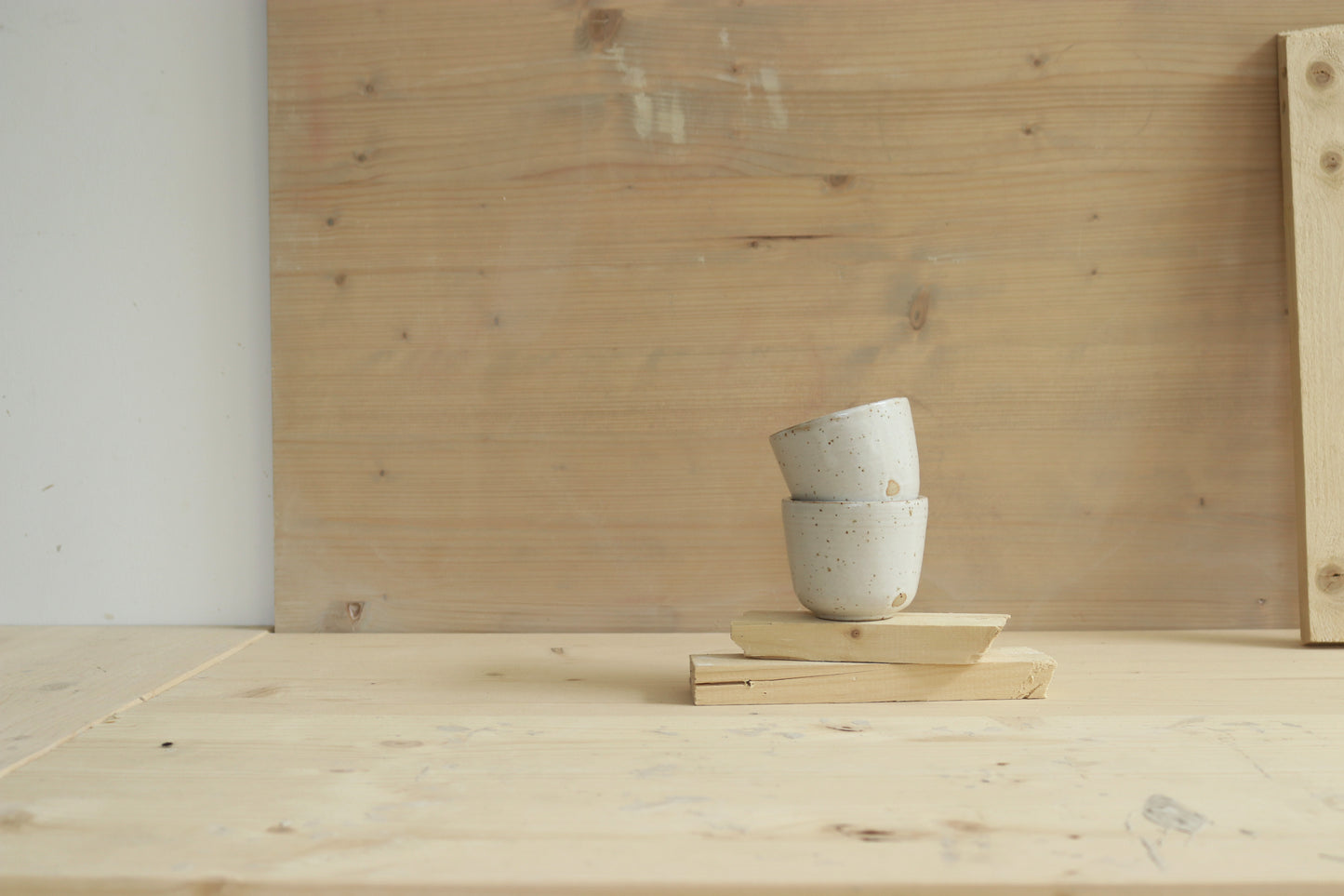 Handmade speckled stoneware ceramic sip cups covered in satin white glaze. Made with lots of love in Lithuania.