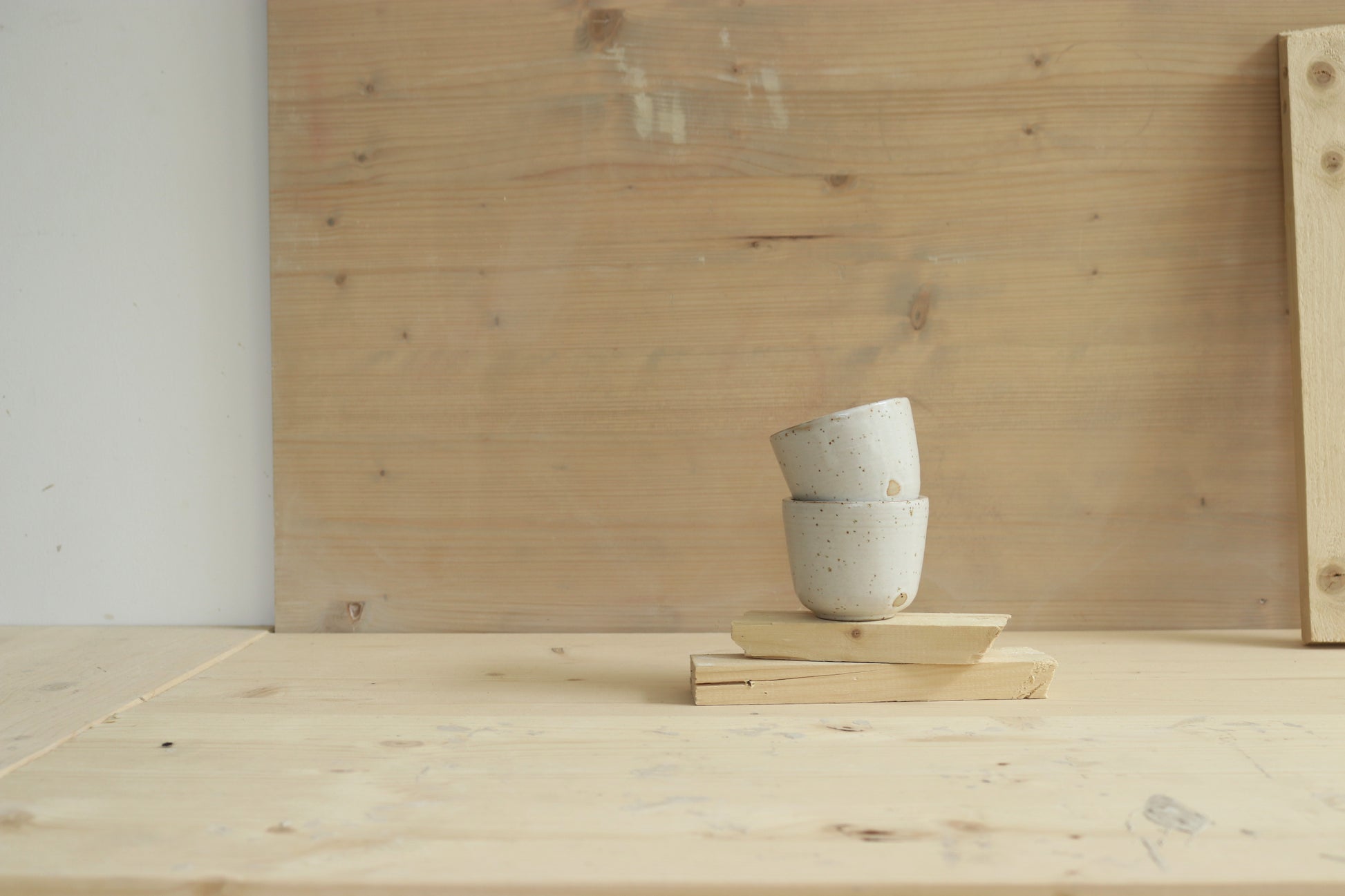 Handmade speckled stoneware ceramic sip cups covered in satin white glaze. Made with lots of love in Lithuania.