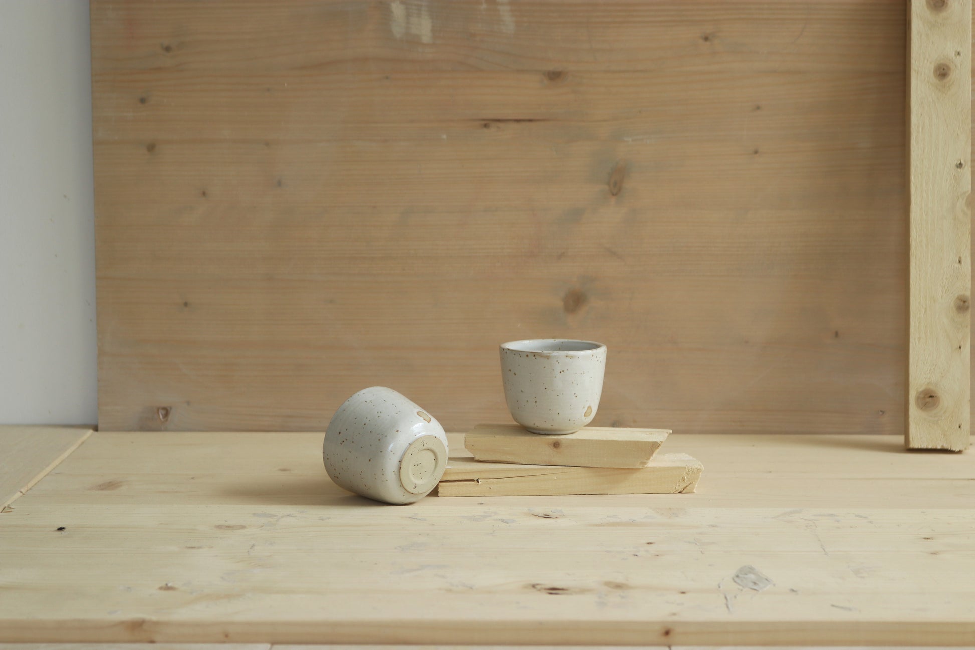 Handmade speckled stoneware ceramic sip cups covered in satin white glaze. Made with lots of love in Lithuania.