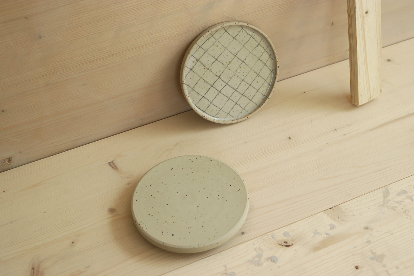 Handmade speckled stoneware ceramic snack plate in grid pattern and covered in clear glaze. Made with lots of love in Lithuania.