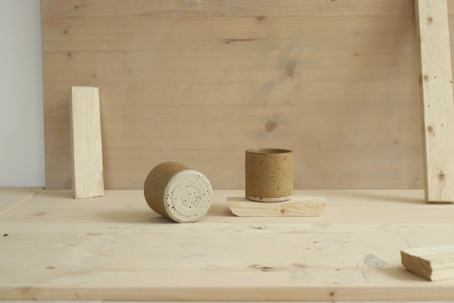 Handmade speckled stoneware narrow-shaped ceramic sip cups in maple coloured glaze. Made with lots of love in Lithuania.