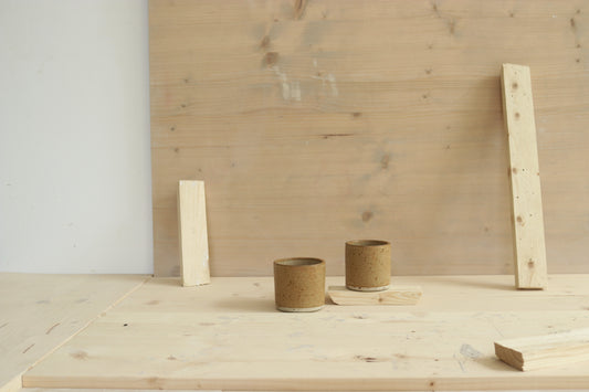 Handmade speckled stoneware narrow-shaped ceramic sip cups in maple coloured glaze. Made with lots of love in Lithuania.